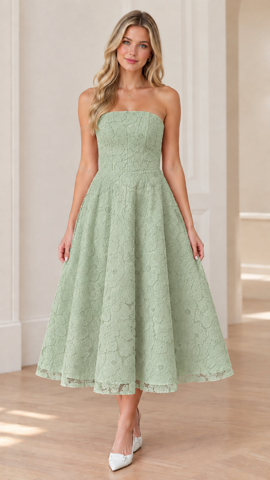 Front view of woman wearing strapless sage green floral lace midi dress