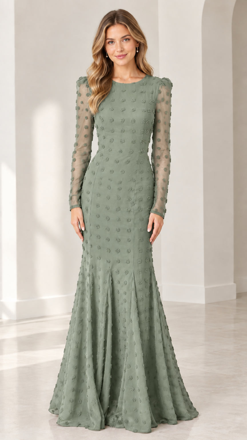 Full front view of model wearing sage green long sleeve swiss dot mermaid evening gown