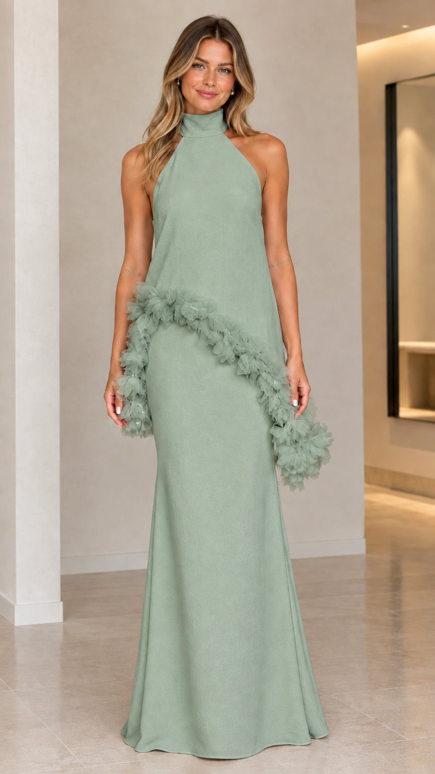Front view of sage green halter maxi dress with cascading textured trim
