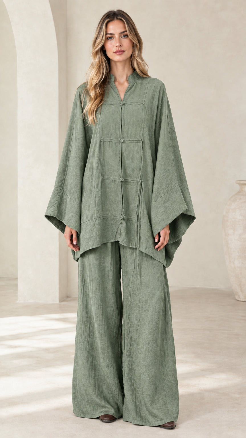 Front view of women's sage green frog button tunic and wide leg pant set