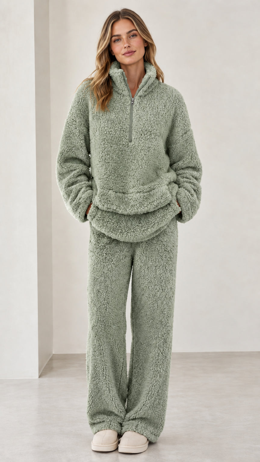 Model wearing sage green sherpa fleece quarter-zip loungewear set