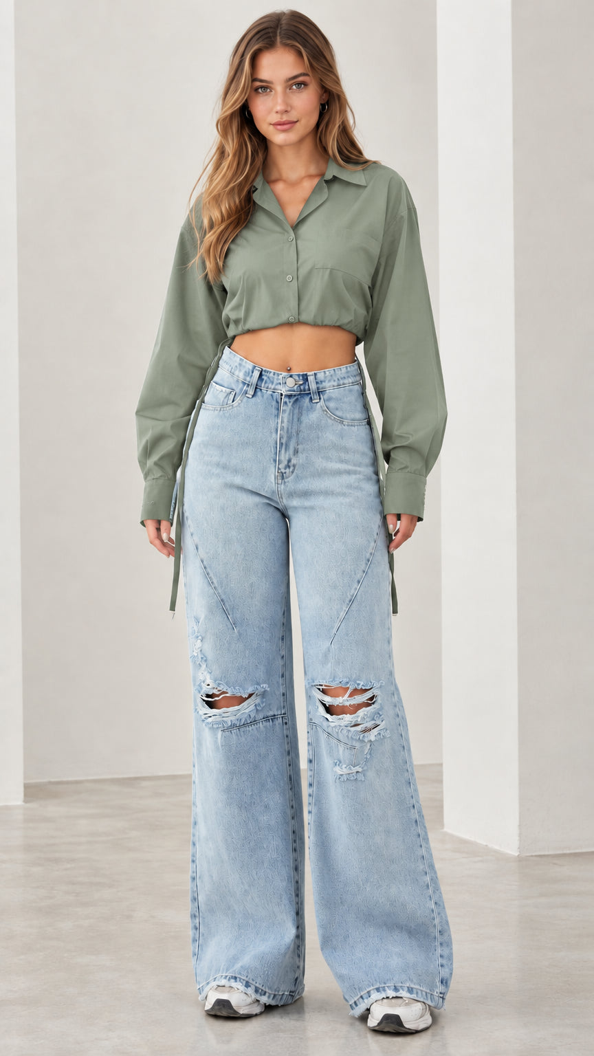 Front view of woman wearing sage green cropped button down shirt
