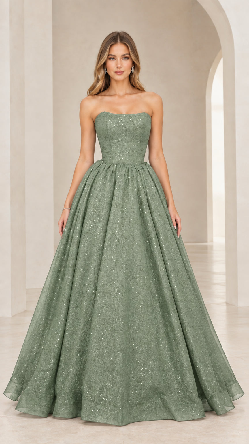 Front view of model in sage green strapless glitter A-line ball gown