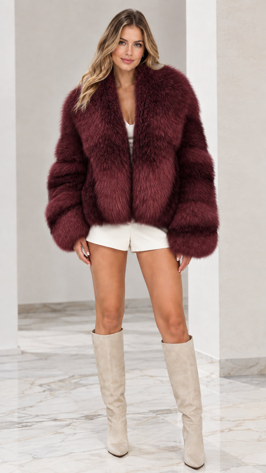 Front view of model wearing Burgundy plush faux fur jacket