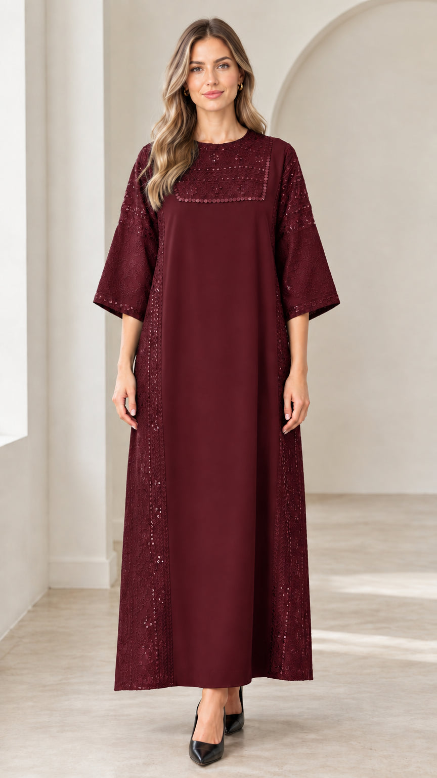 Front view of woman wearing burgundy wine red sequin embellished maxi dress