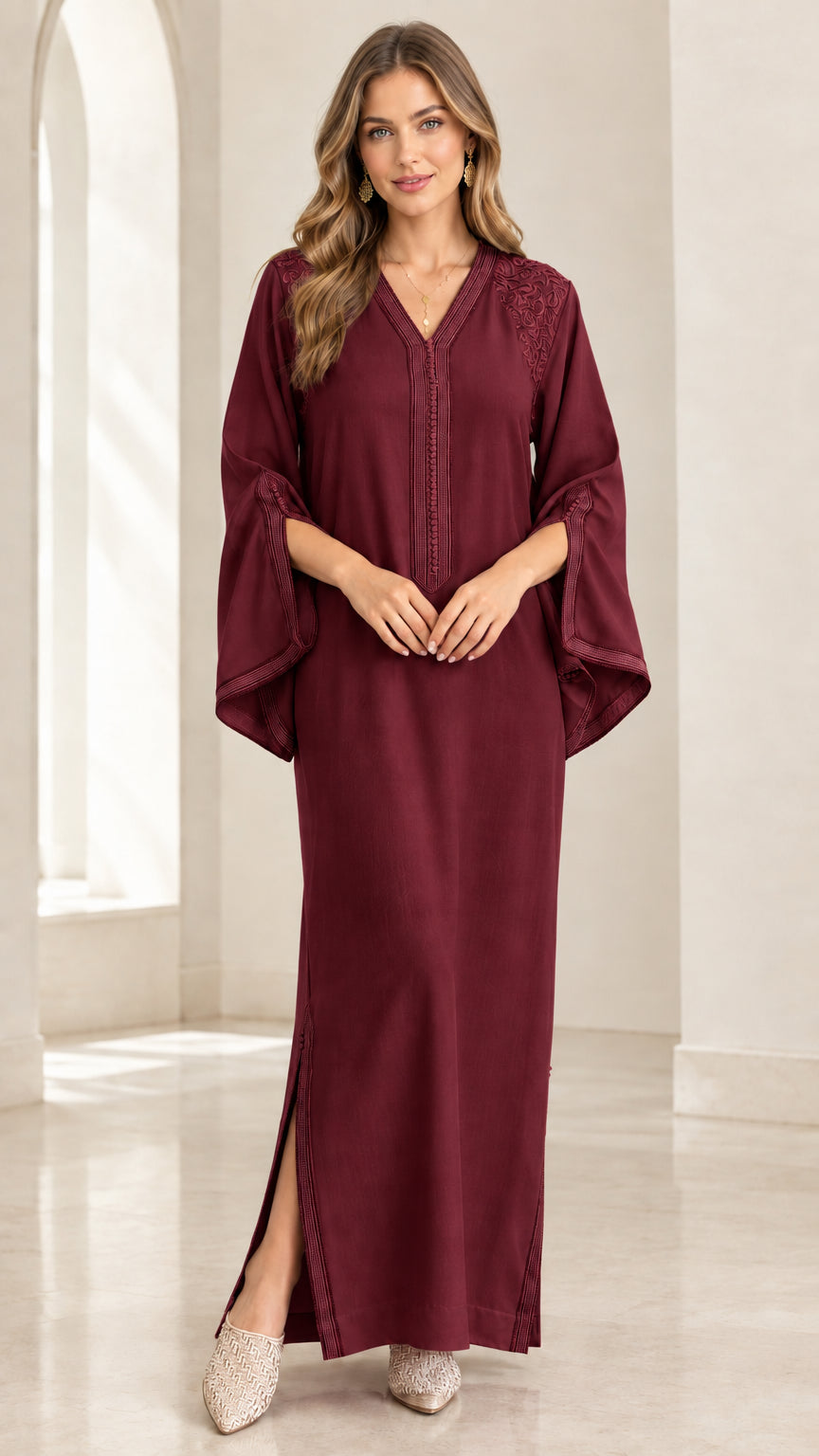 Front full-length view of woman wearing Burgundy embroidered kaftan maxi dress