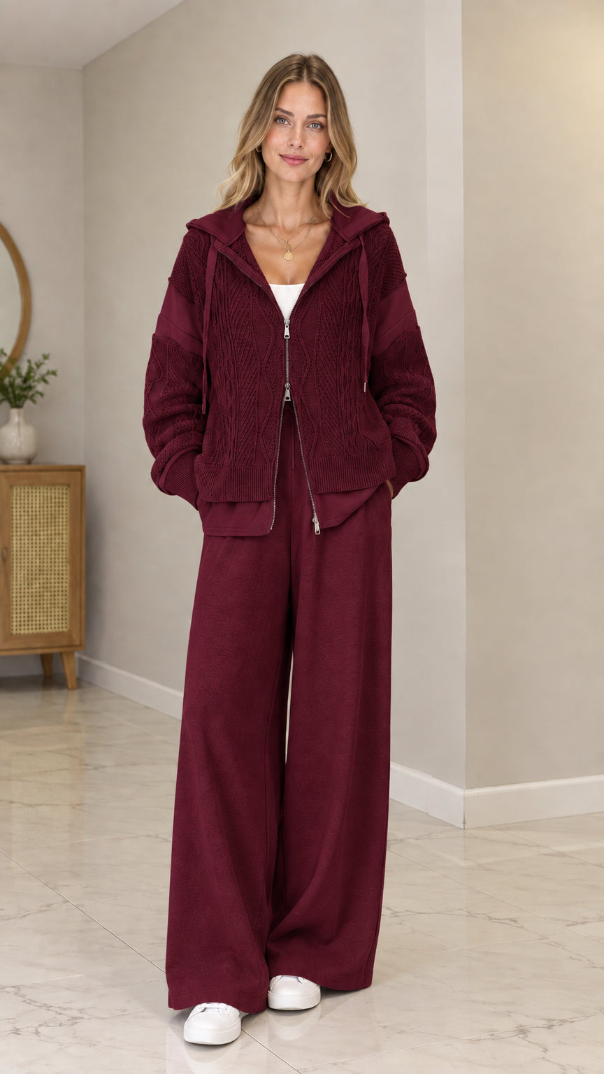 Front view of model wearing Burgundy cable-knit zip-up hooded cardigan set