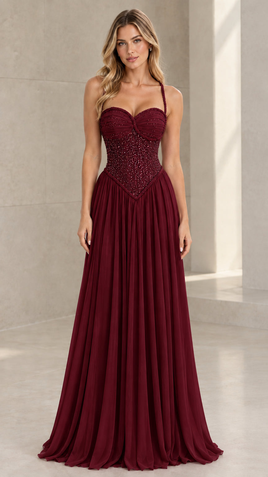 Front view of model wearing Burgundy wine sweetheart beaded chiffon evening gown