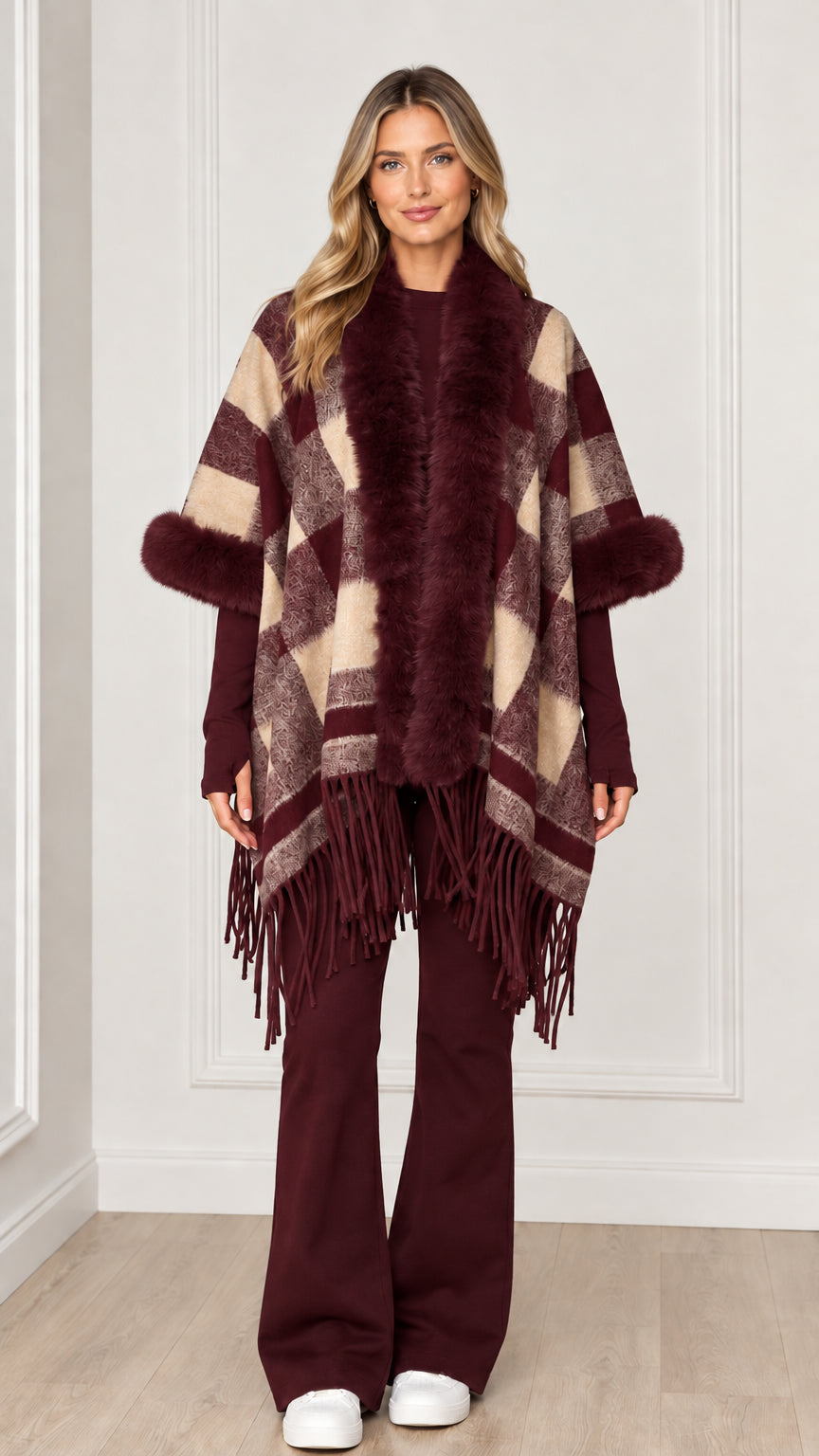 Woman wearing burgundy wine plaid poncho wrap with matching faux fur trim