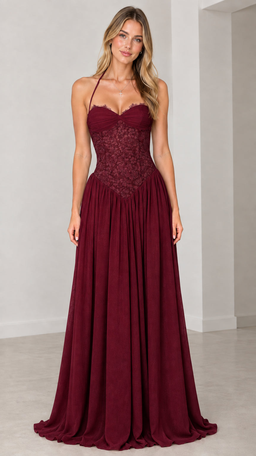 Front view of model wearing burgundy red lace halter evening dress