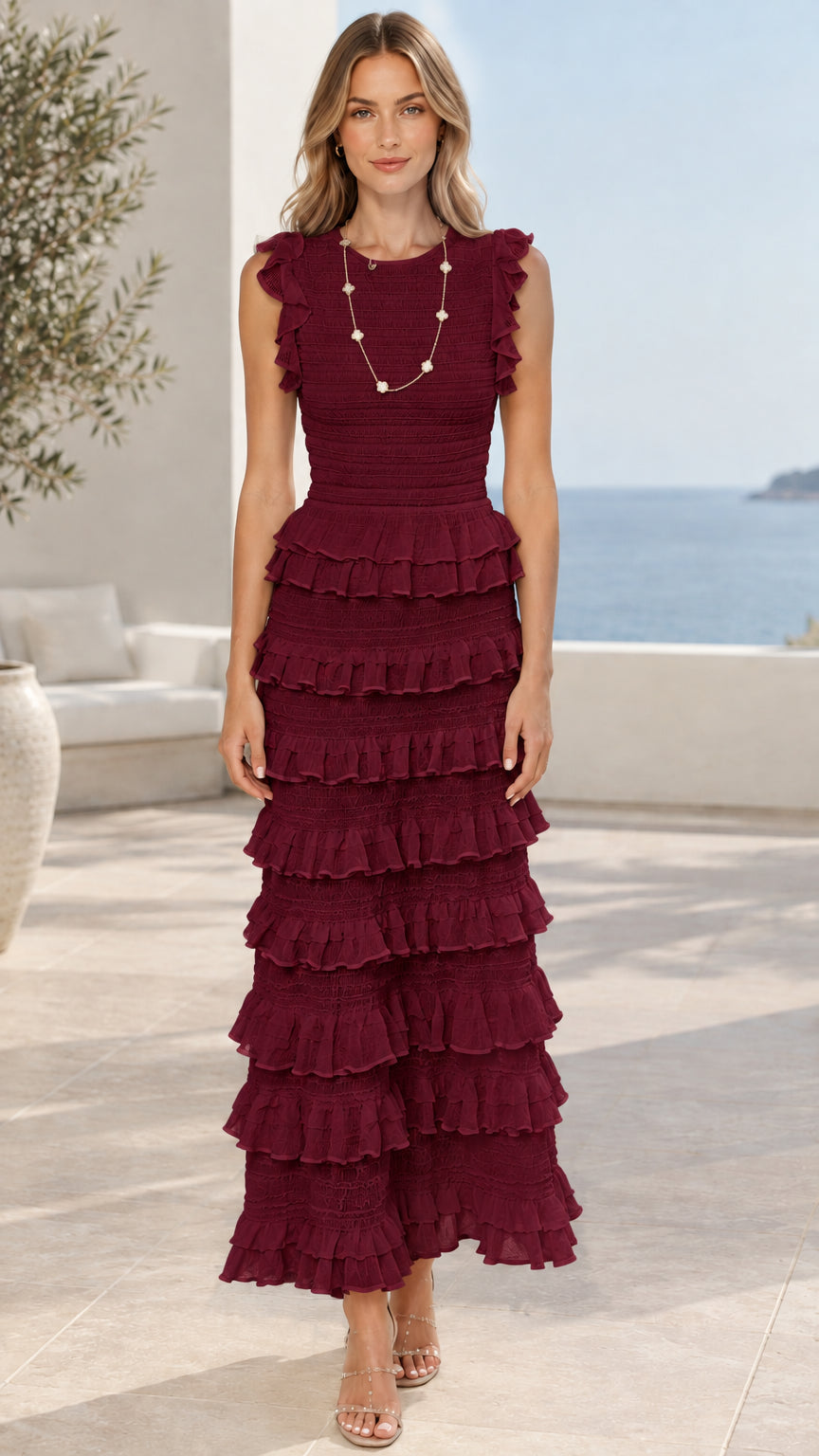 Model wearing burgundy red sleeveless tiered ruffle maxi dress