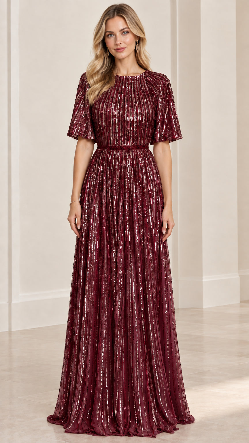 Front view of woman wearing burgundy wine sequin flutter sleeve evening dress