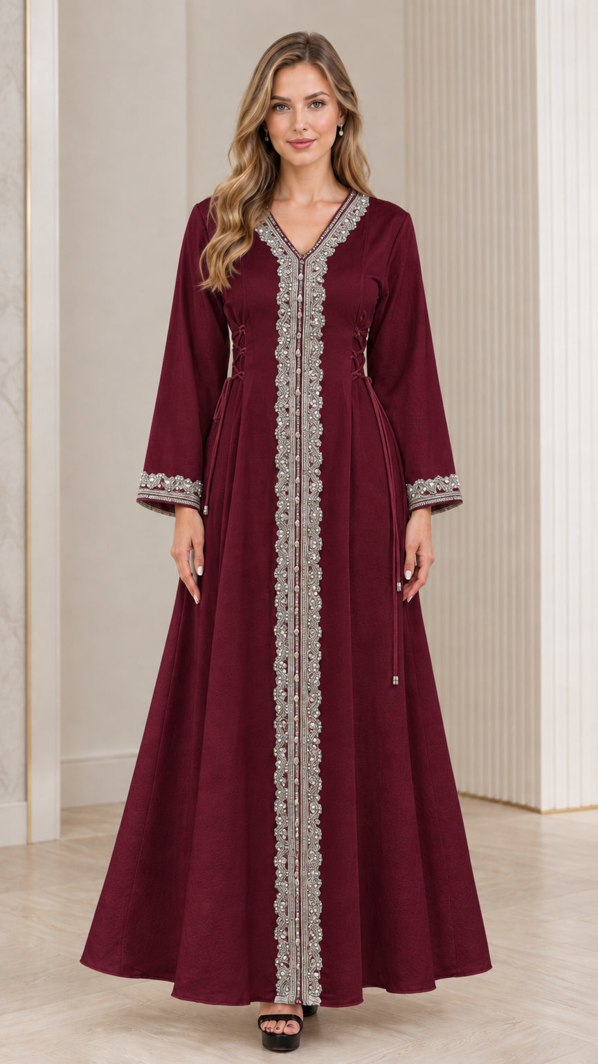 Full-length view of woman wearing burgundy wine red embroidered kaftan dress