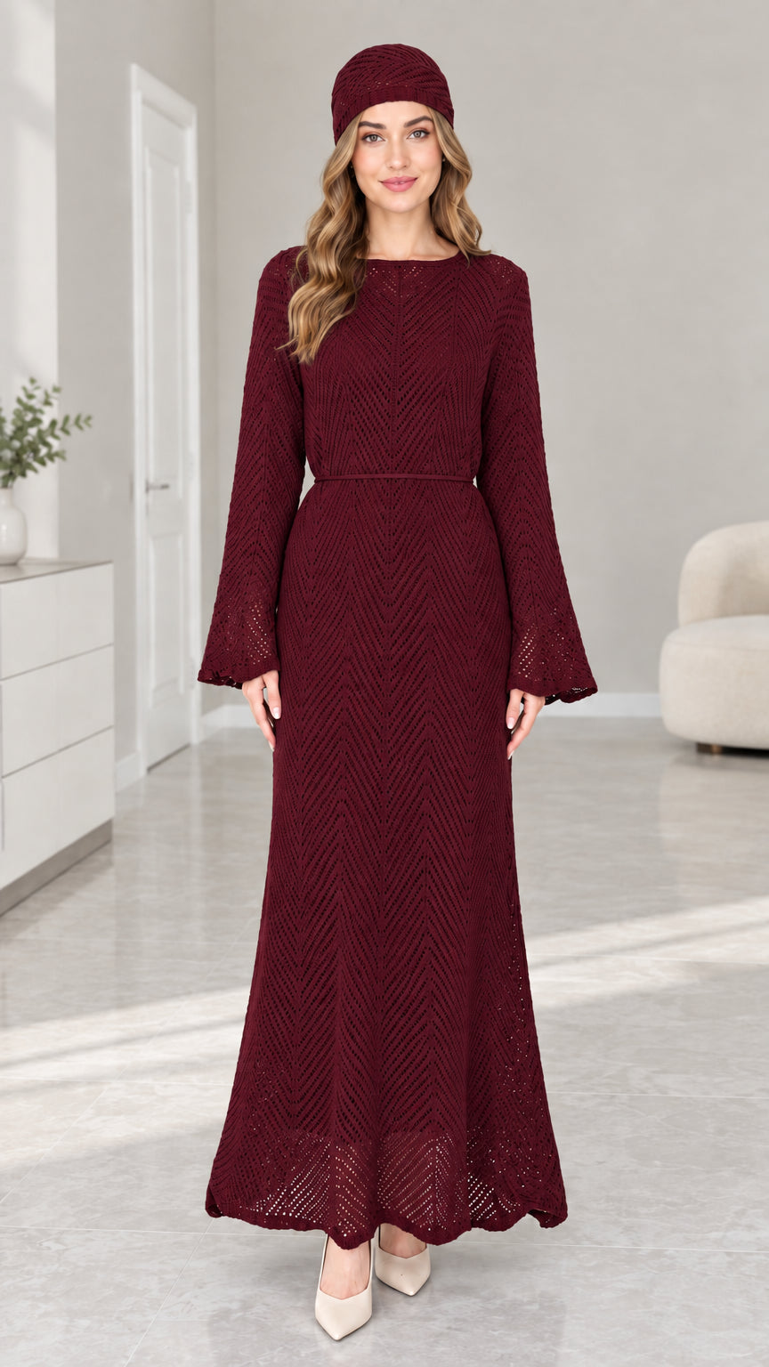 Front view of woman wearing Burgundy pointelle knit flared sleeve maxi dress