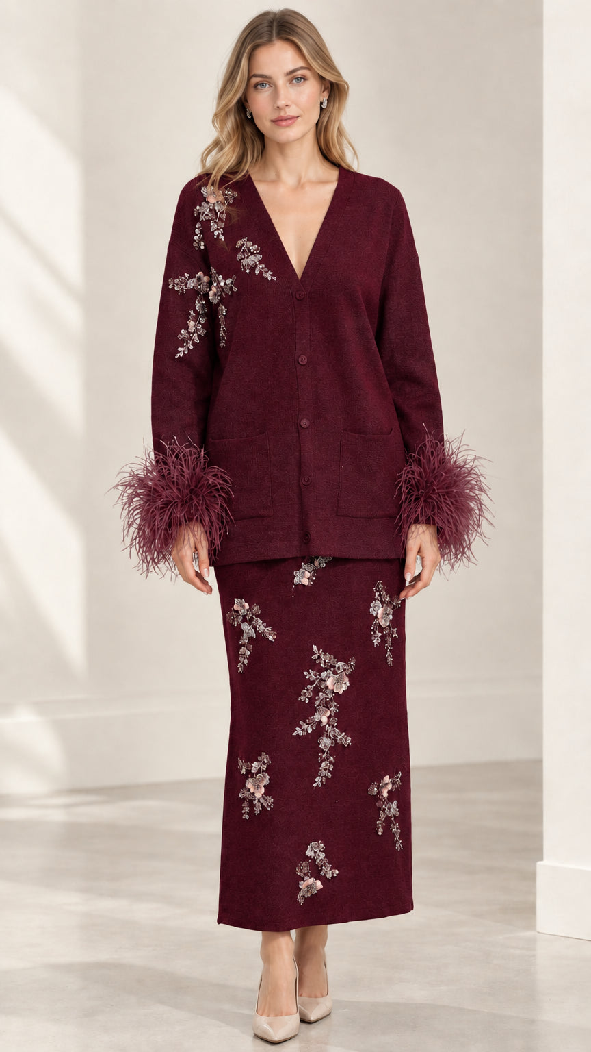 Model wearing Burgundy floral embellished knit cardigan and maxi skirt set
