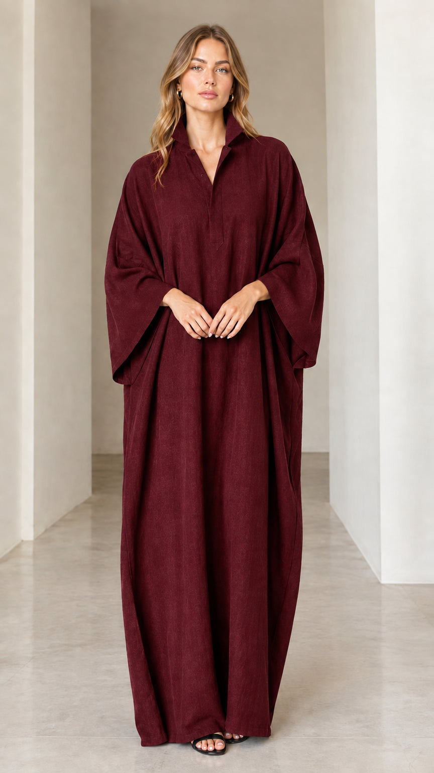 Model wearing rich burgundy wine red collared maxi kaftan dress