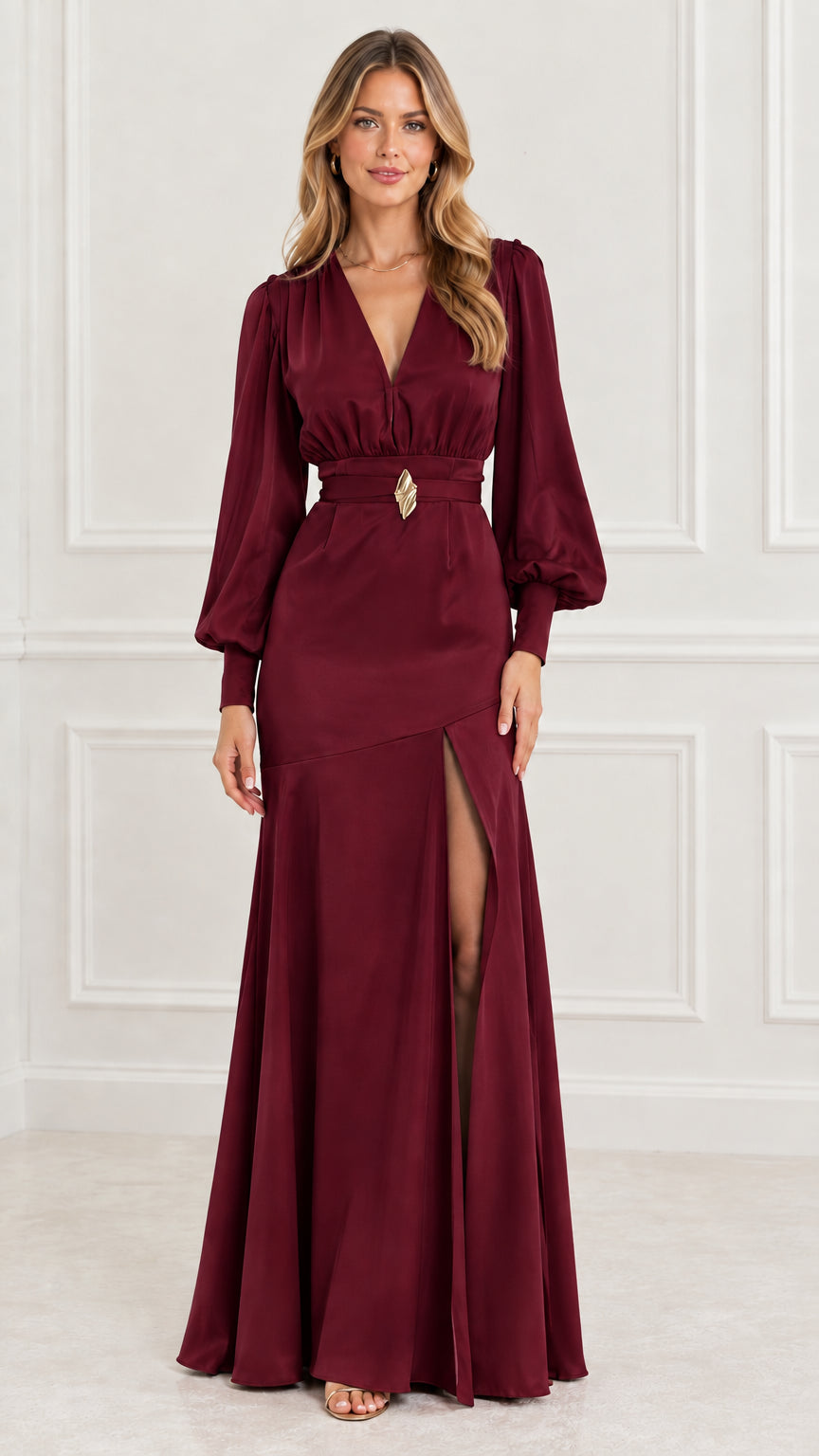 Full-length front view of model in burgundy wine satin long sleeve evening gown