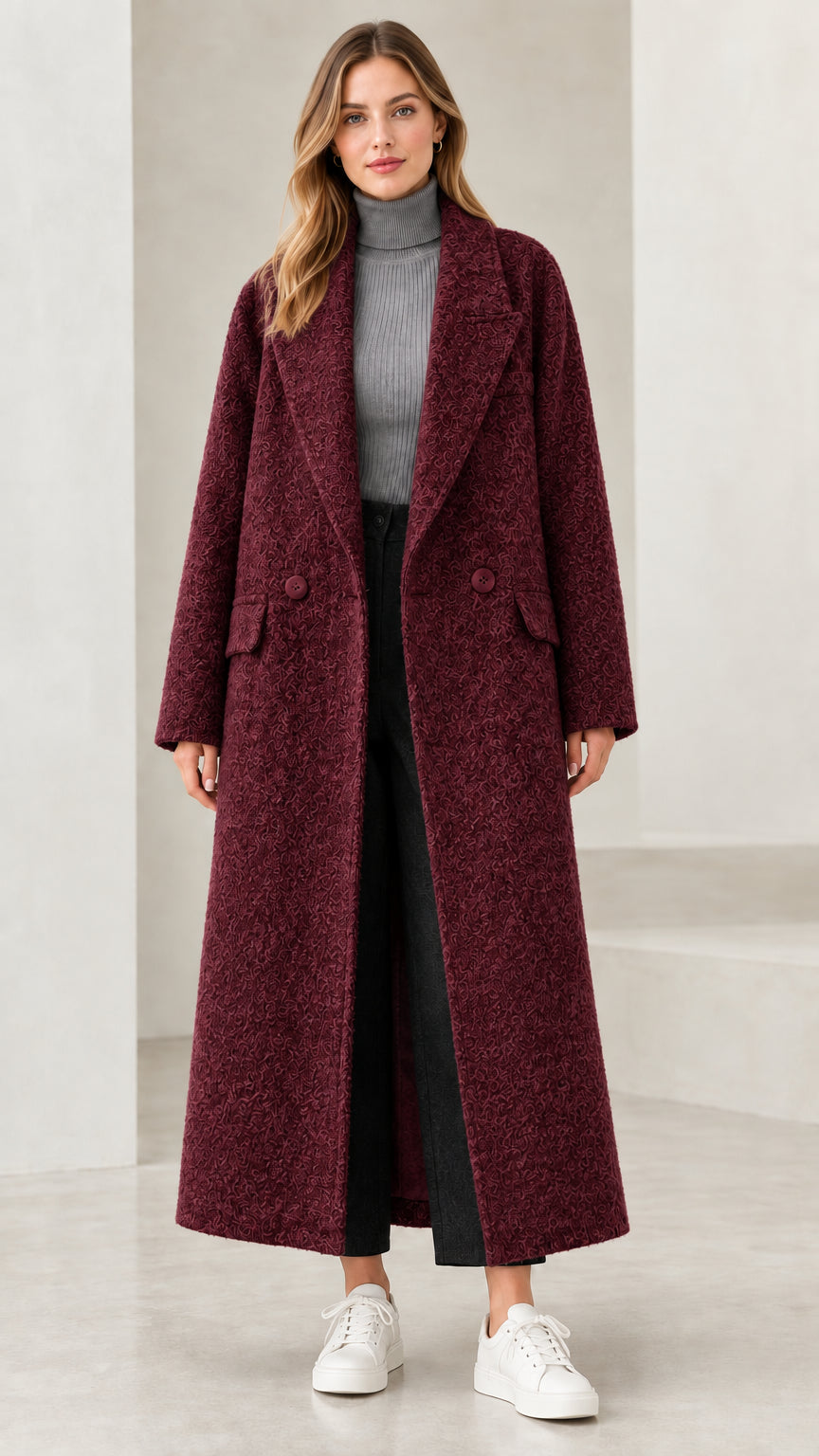 Front view of woman wearing burgundy wine longline bouclé overcoat