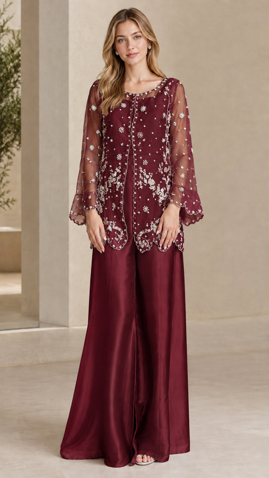 Model wearing Burgundy red embroidered formal tunic and evening pant set