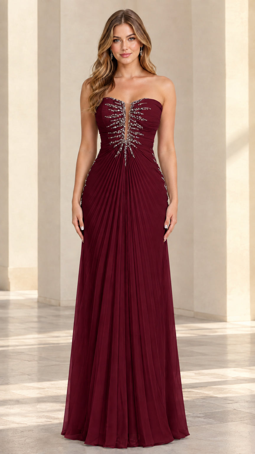 Front view of model wearing burgundy red strapless pleated chiffon evening dress