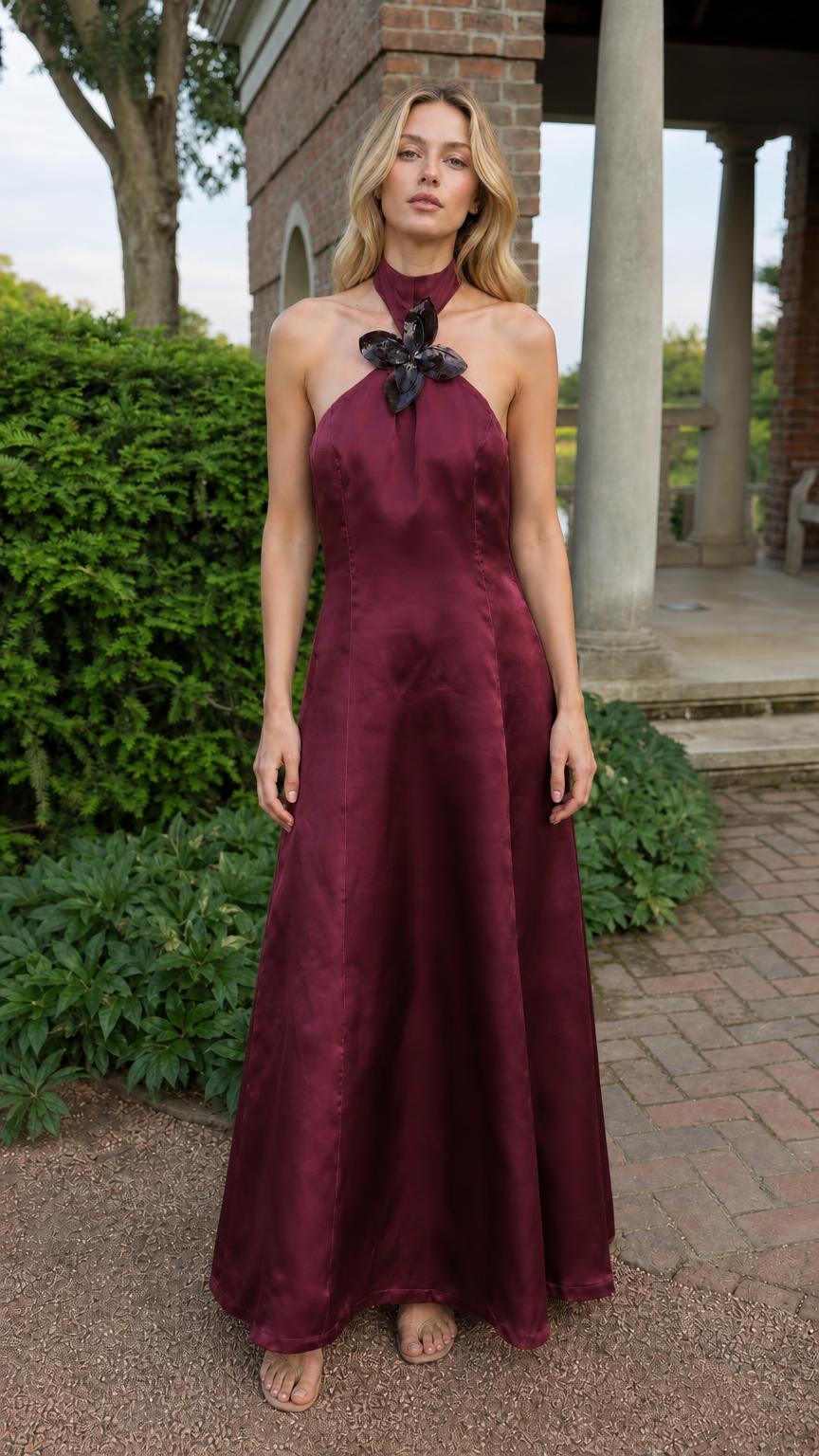 Full front view of model in burgundy satin halter maxi dress