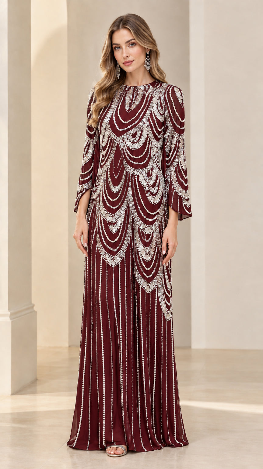 Front full-length view of burgundy red sequin and bead embellished evening gown