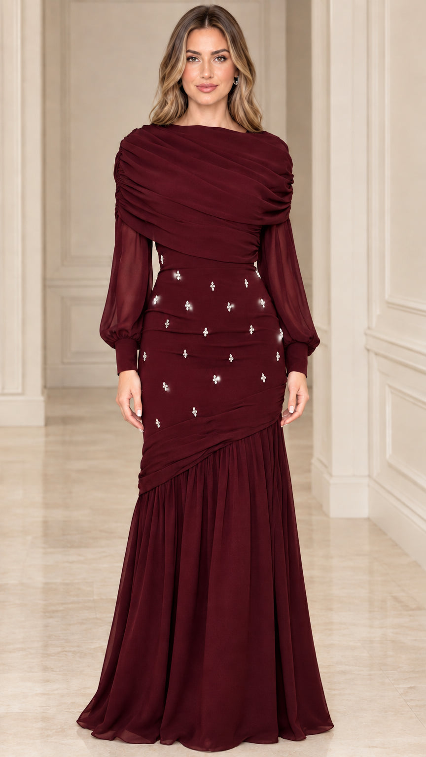 Model wearing deep burgundy red long sleeve evening gown
