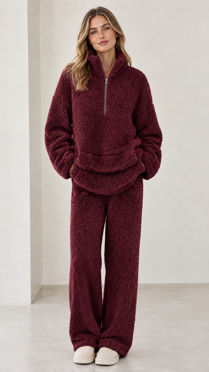 Model wearing burgundy wine red fleece pullover and matching pants set