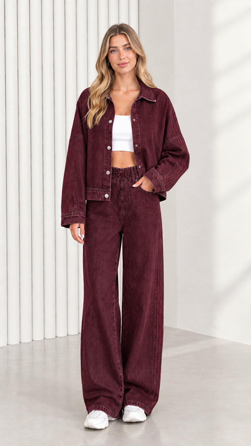 Model wearing Burgundy red denim jacket and matching wide leg pants set