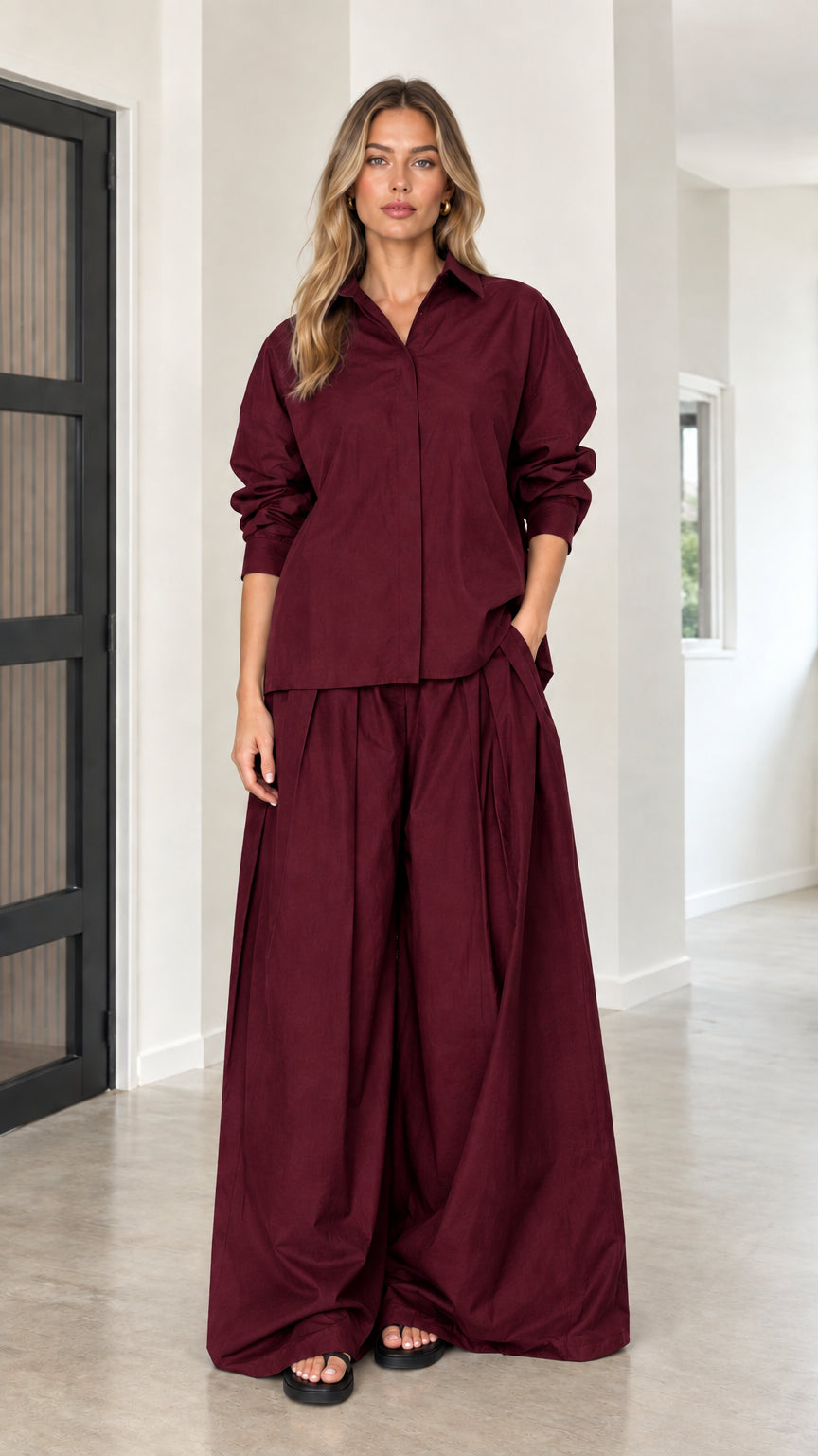 Burgundy wine red matching set featuring pleated button-down blouse and maxi wide trousers