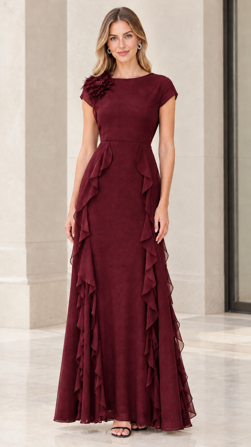 Front view of woman wearing rich burgundy floral appliqué formal evening dress