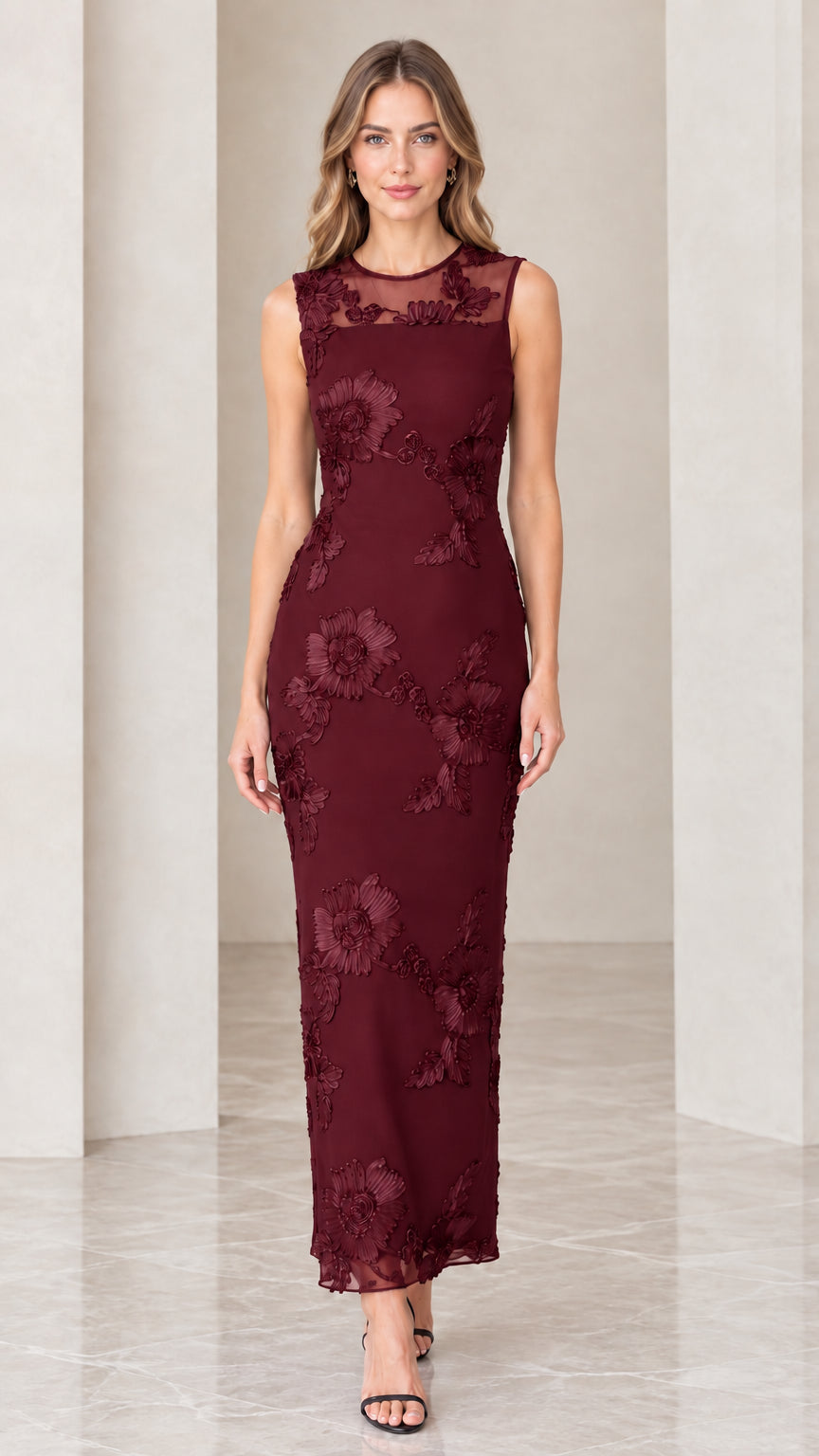 Model wearing burgundy red floral appliqué sleeveless column maxi dress