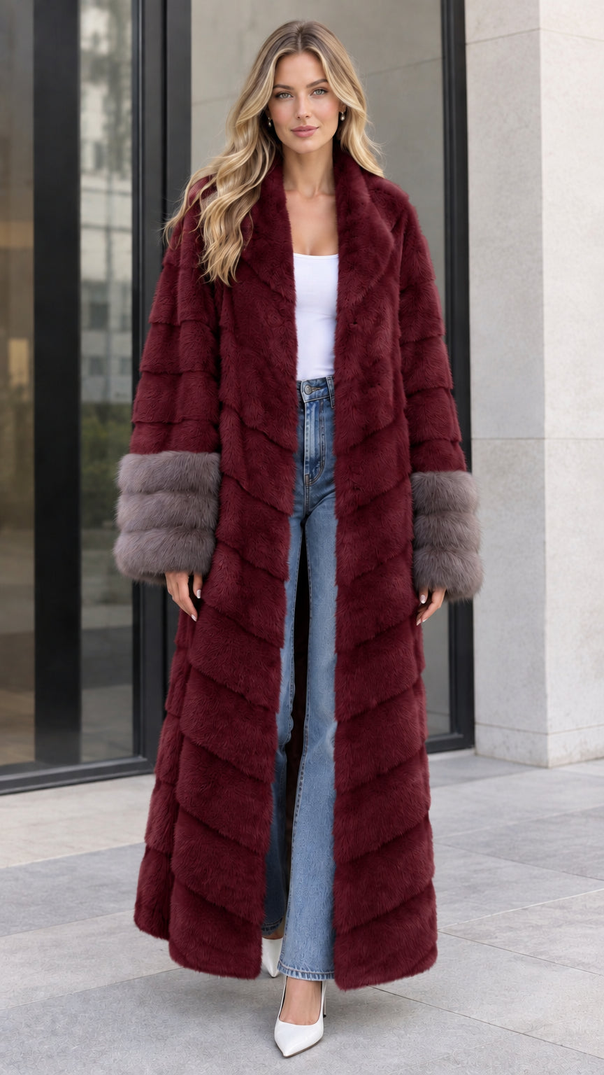 Front view of women's burgundy wine chevron maxi faux fur coat with contrast grey cuffs
