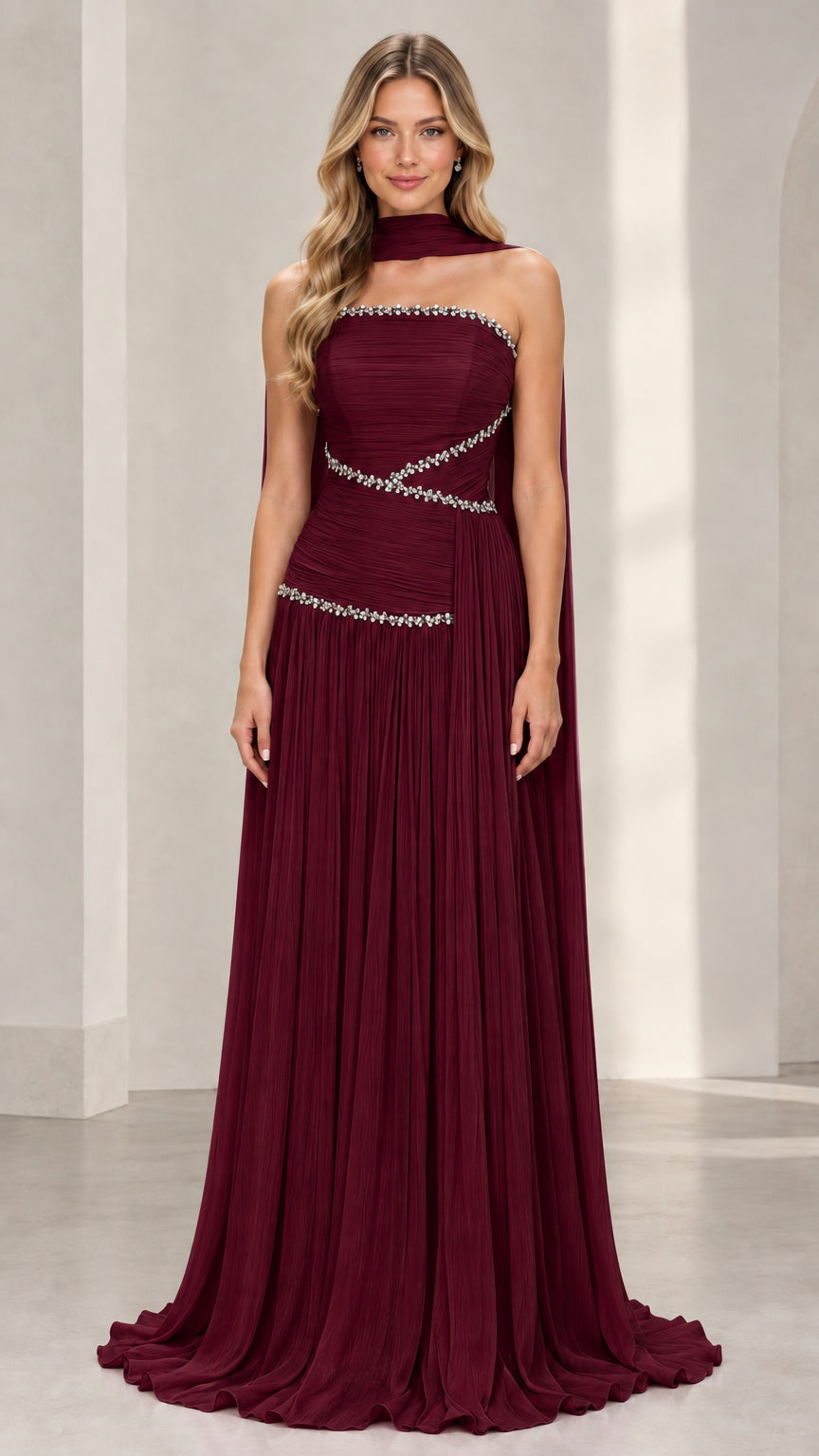 Burgundy wine strapless evening gown with sparkling embellishments and scarf cape
