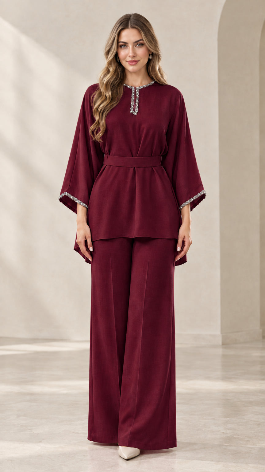 Full-length front view of burgundy rhinestone-embellished tunic top and wide-leg pants set