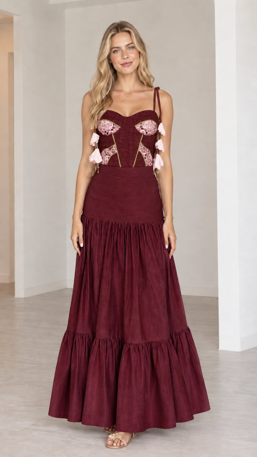 Burgundy wine two-piece embroidered bustier and tiered maxi skirt