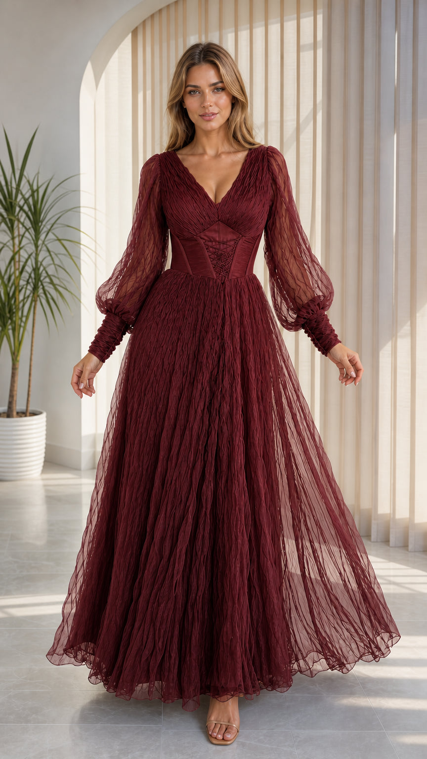Front view of model wearing burgundy wine red corset tulle formal dress