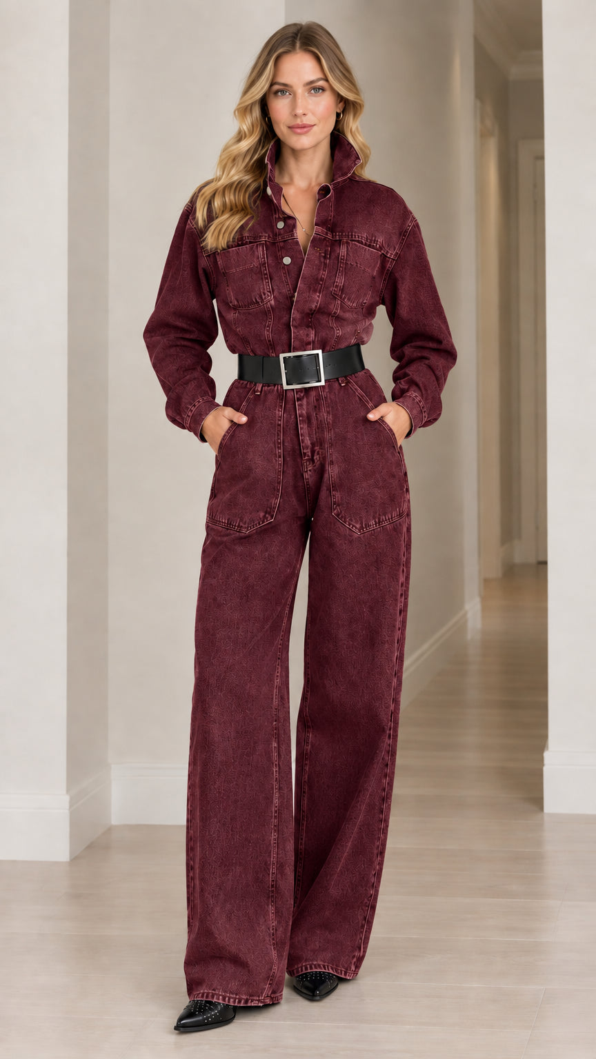 Full-length view of woman wearing burgundy wine belted denim wide leg jumpsuit