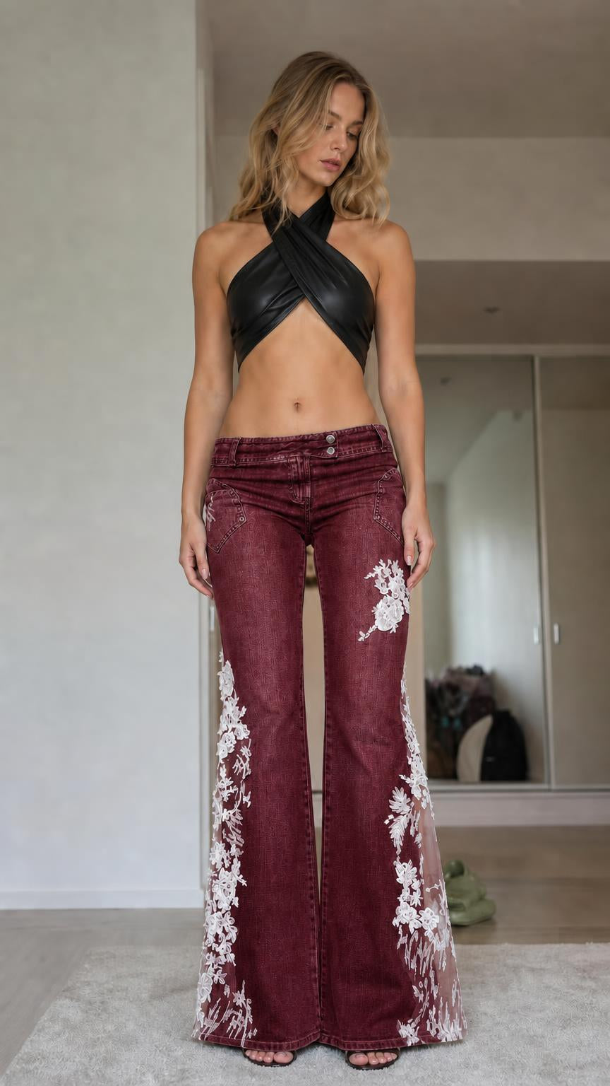 Model wearing burgundy lace-paneled flare jeans