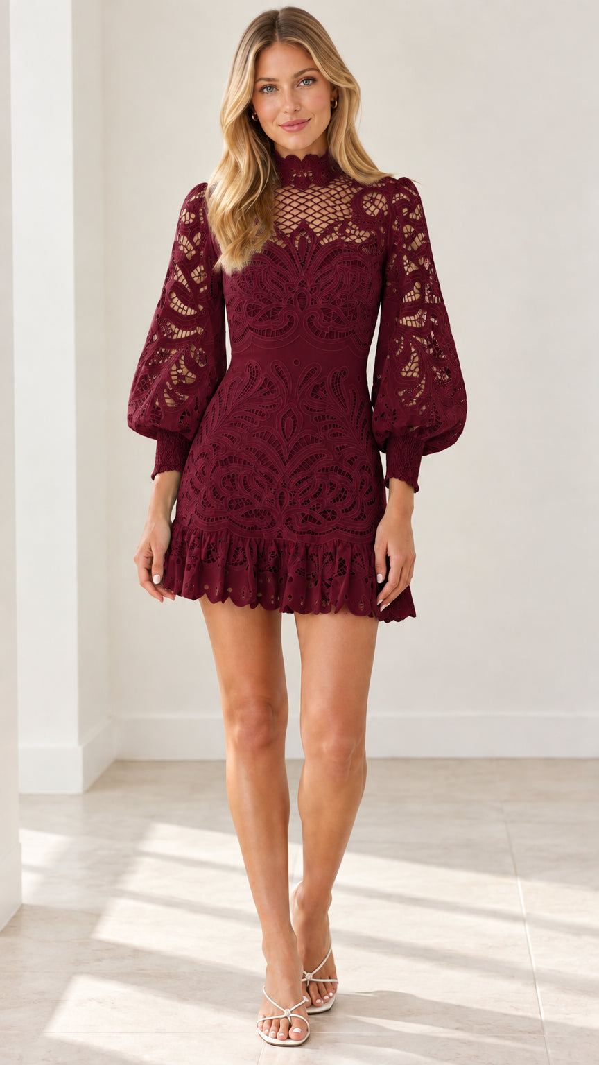 Front view of model wearing Burgundy long sleeve lace cocktail mini dress