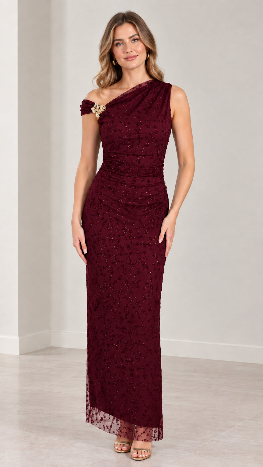 Full-length view of burgundy one-shoulder beaded lace formal evening gown