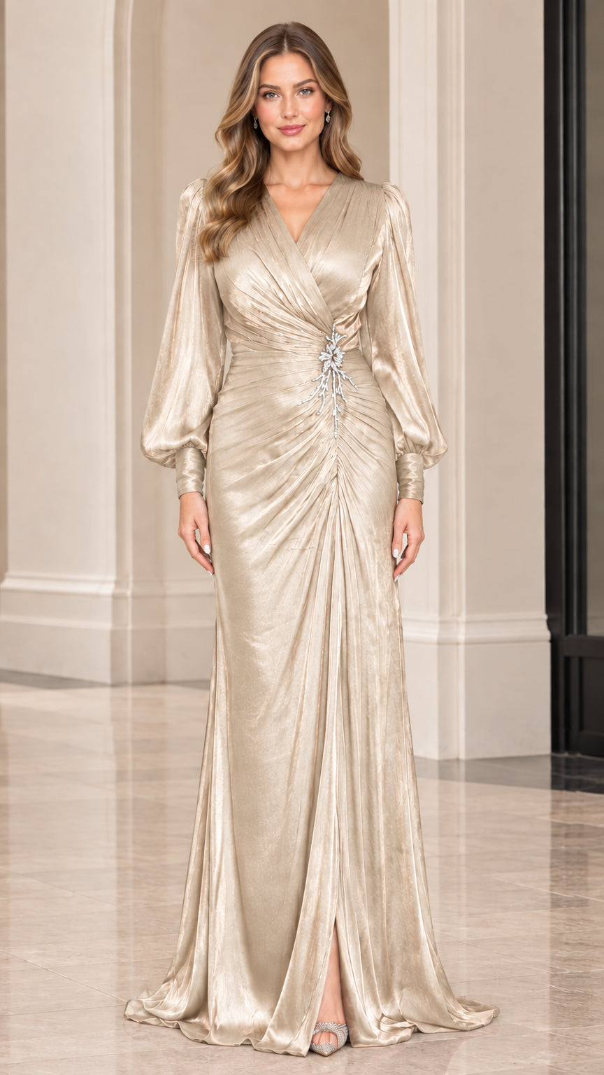 Front view of champagne gold long sleeve ruched evening dress with crystal detail