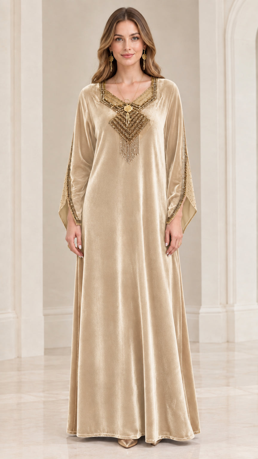 Front view of champagne beige velvet kaftan maxi dress with beaded neckline