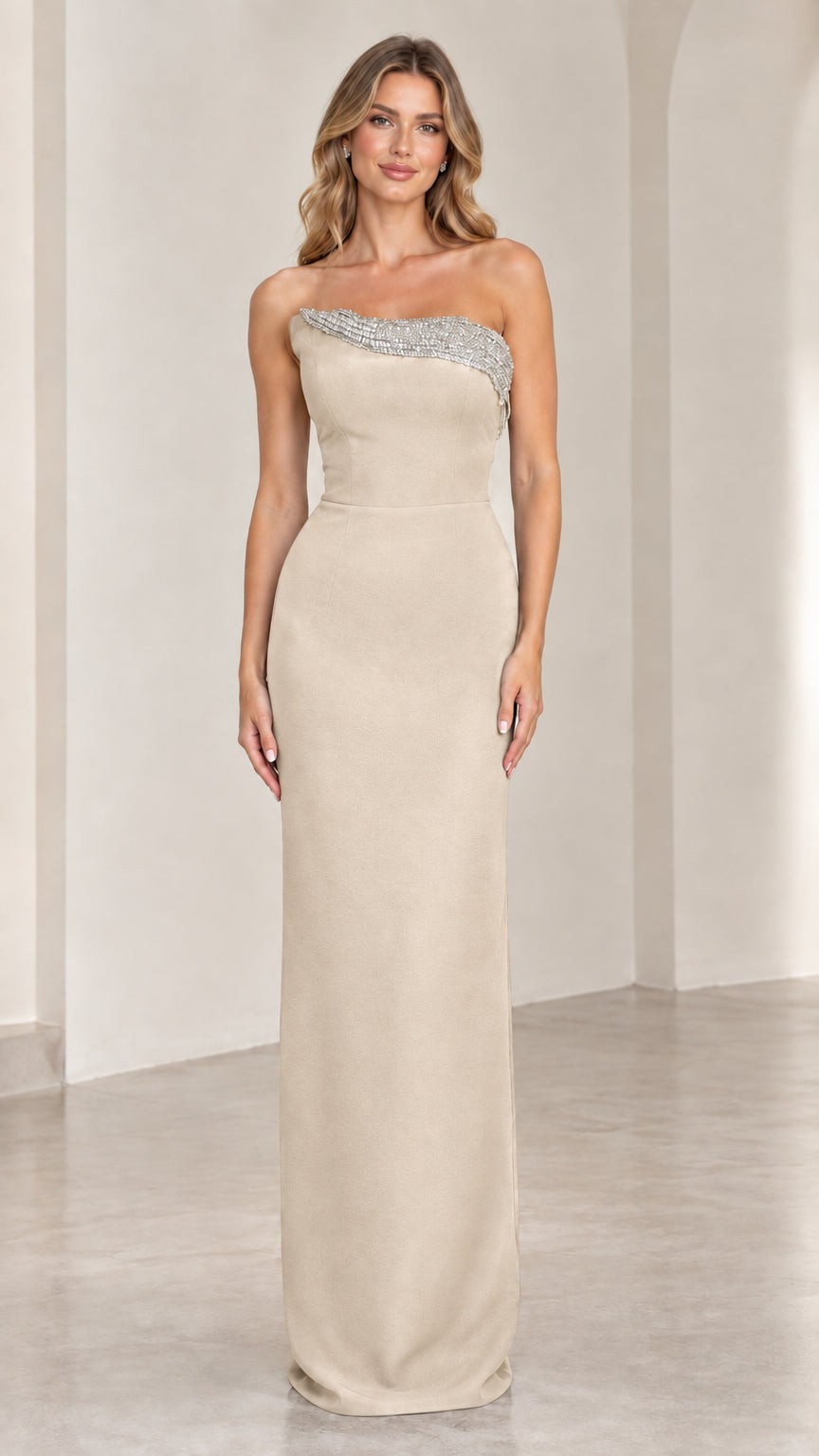 Front view of champagne beige strapless floor-length column gown