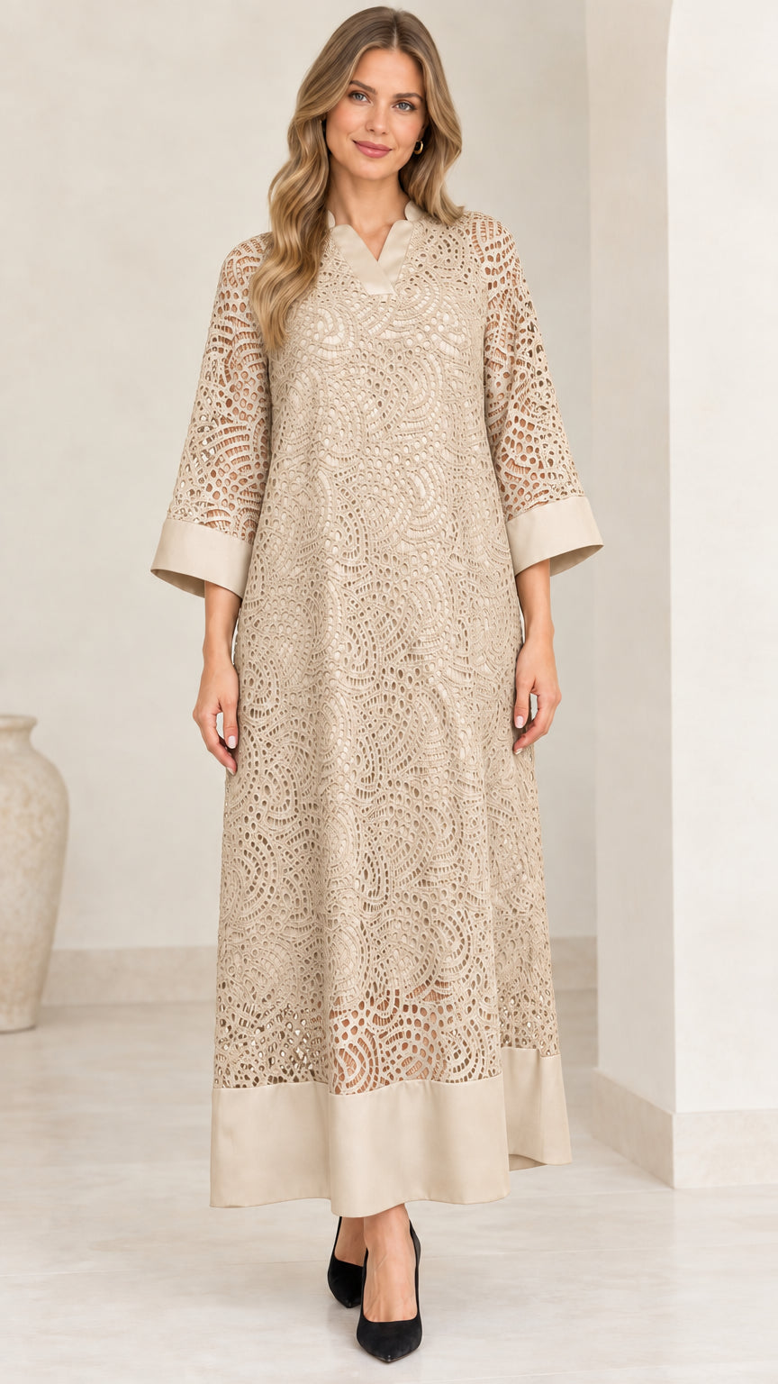 Model wearing champagne beige lace overlay maxi dress