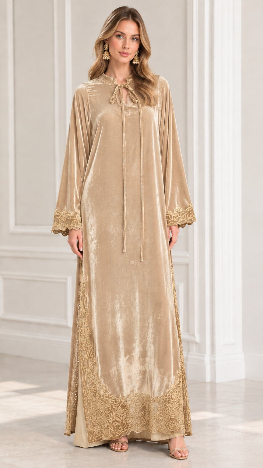 Full front view of model wearing Champagne Gold embroidered velvet kaftan dress