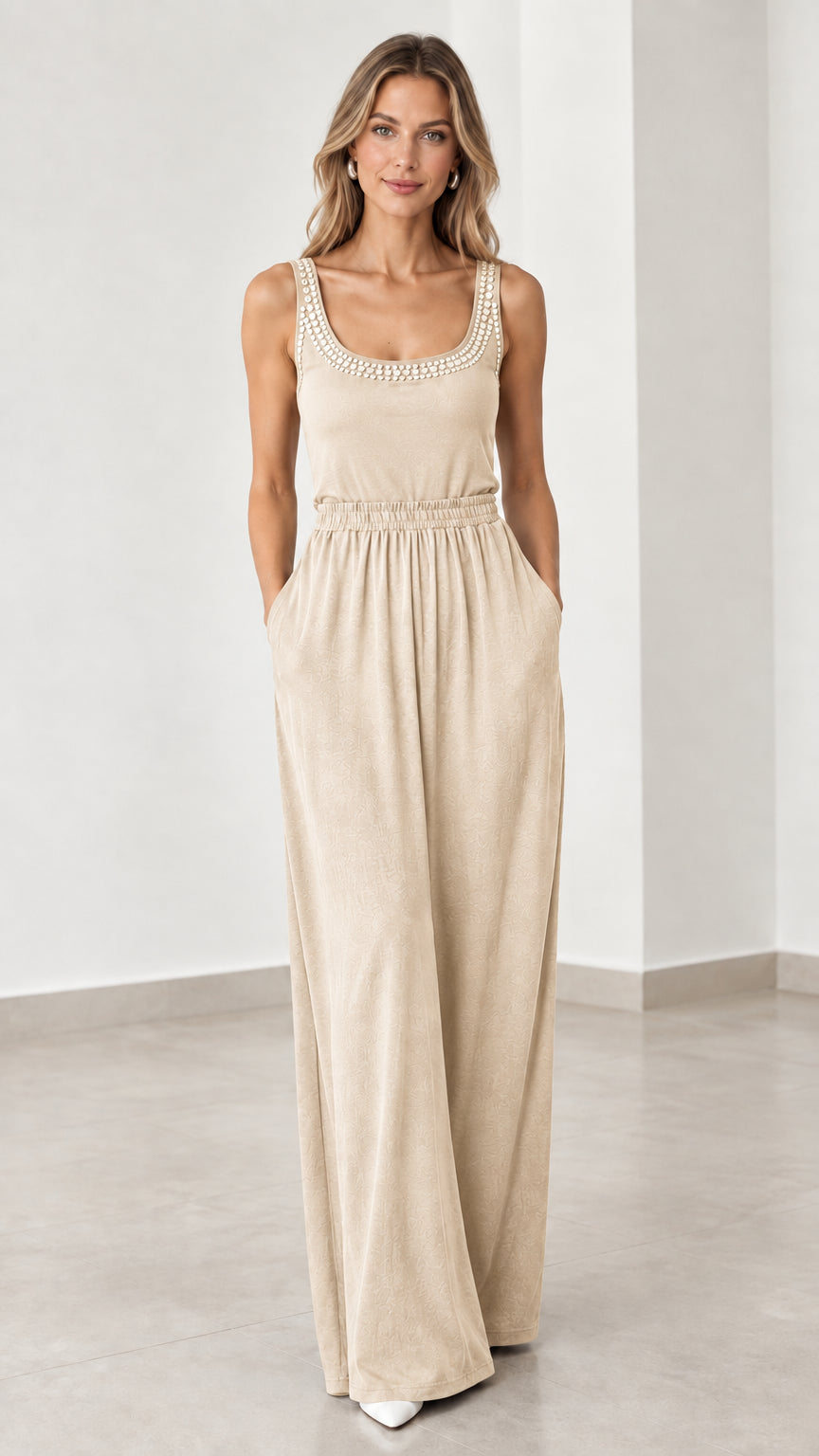 Front view of model wearing beige cream rhinestone scoop neck wide leg jumpsuit