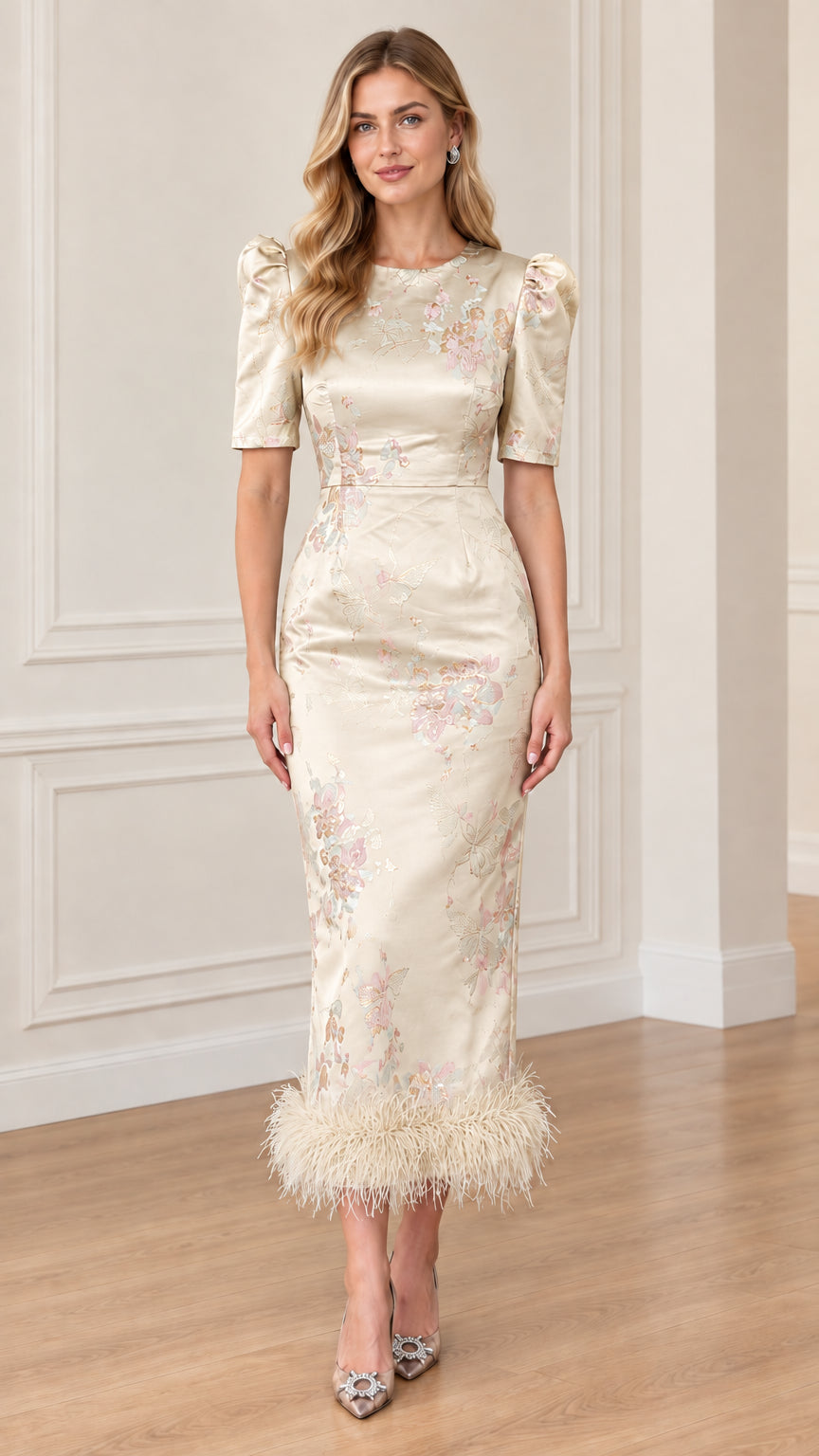 Front view of Champagne ivory floral jacquard midi dress with feather hem