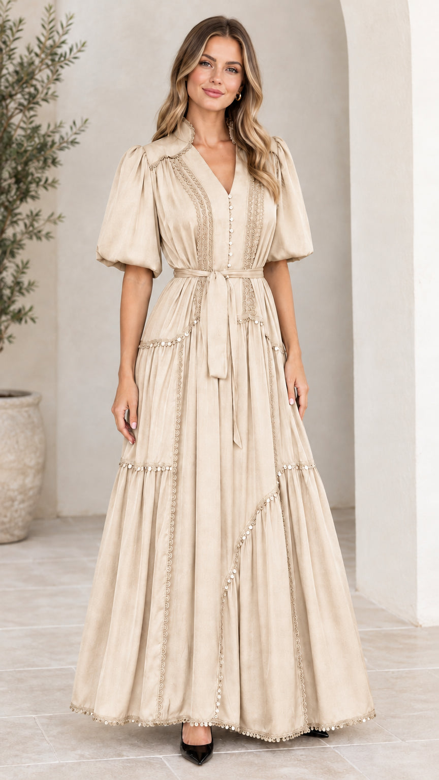 Front view of woman wearing beige champagne tiered puff sleeve maxi dress