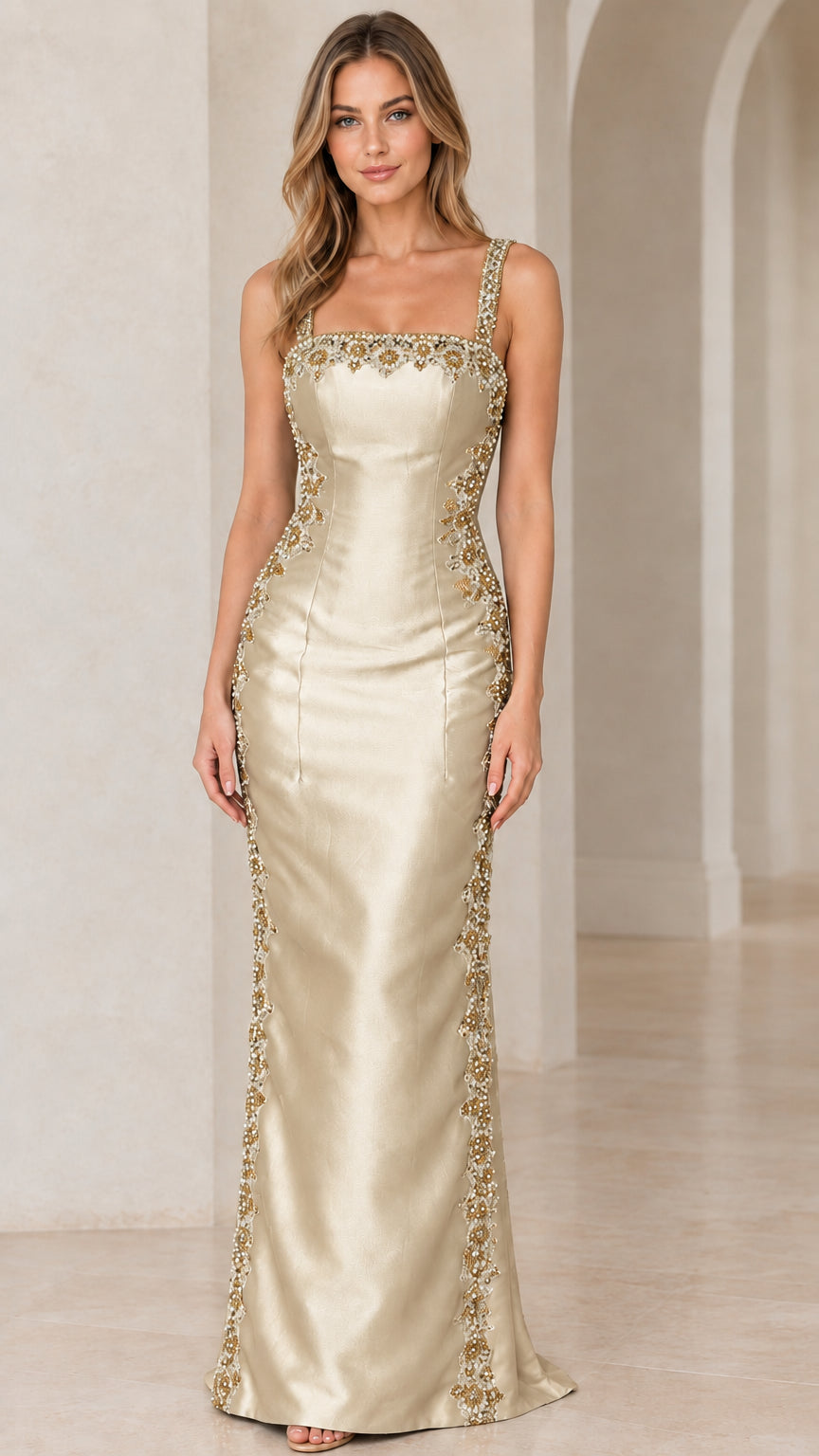 Front view of woman wearing Champagne gold satin column evening gown with beaded trim